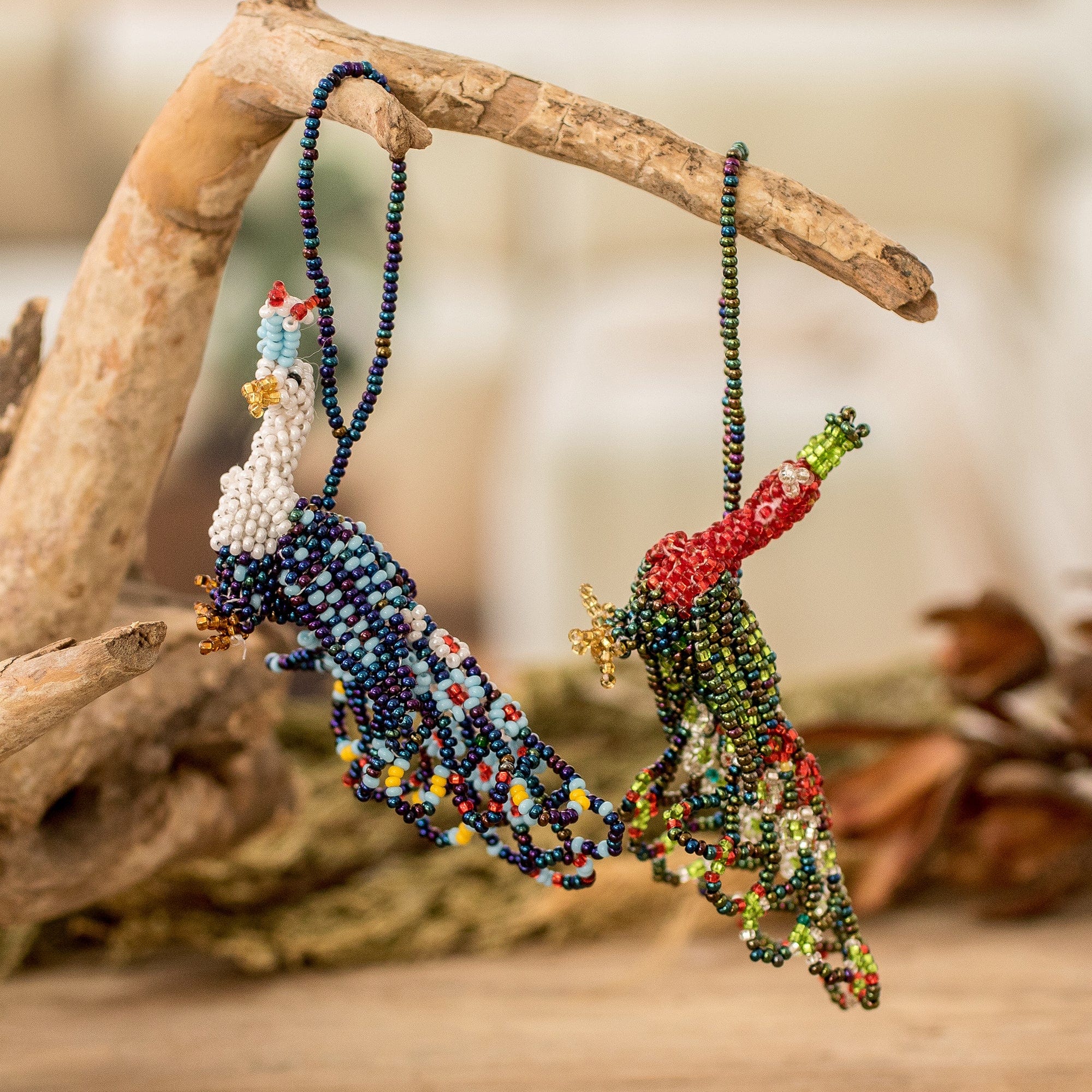 Pair of Glass Beaded Peacock-Themed Ornaments from Guatemala - Peacock Splendor